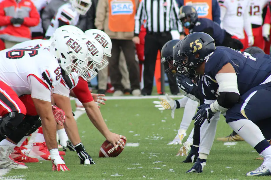 front view of football players with raised footballs