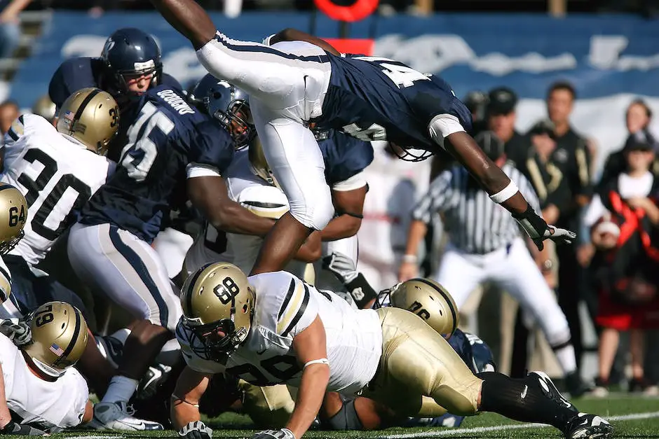 Football players battling for control of the ball