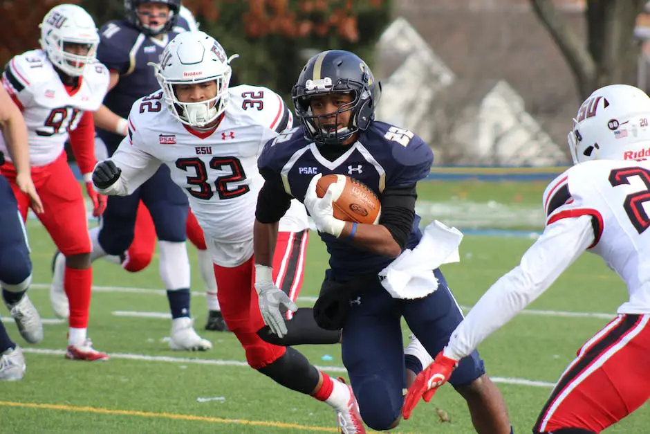 A football player in mid-air with the ball, trying to hurdle over another football player while multiple other players converge on the play.